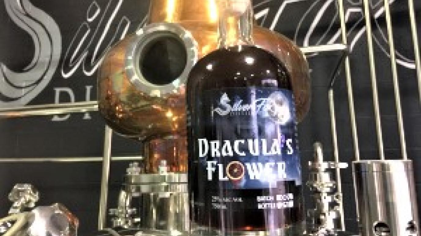 bottle of lavendar and blood orange flavoured liquor