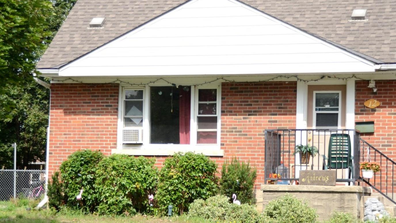 Exterior of 12 Edmonton Drive, Guelph. It is a detatched bungalow with a fenced backyard.