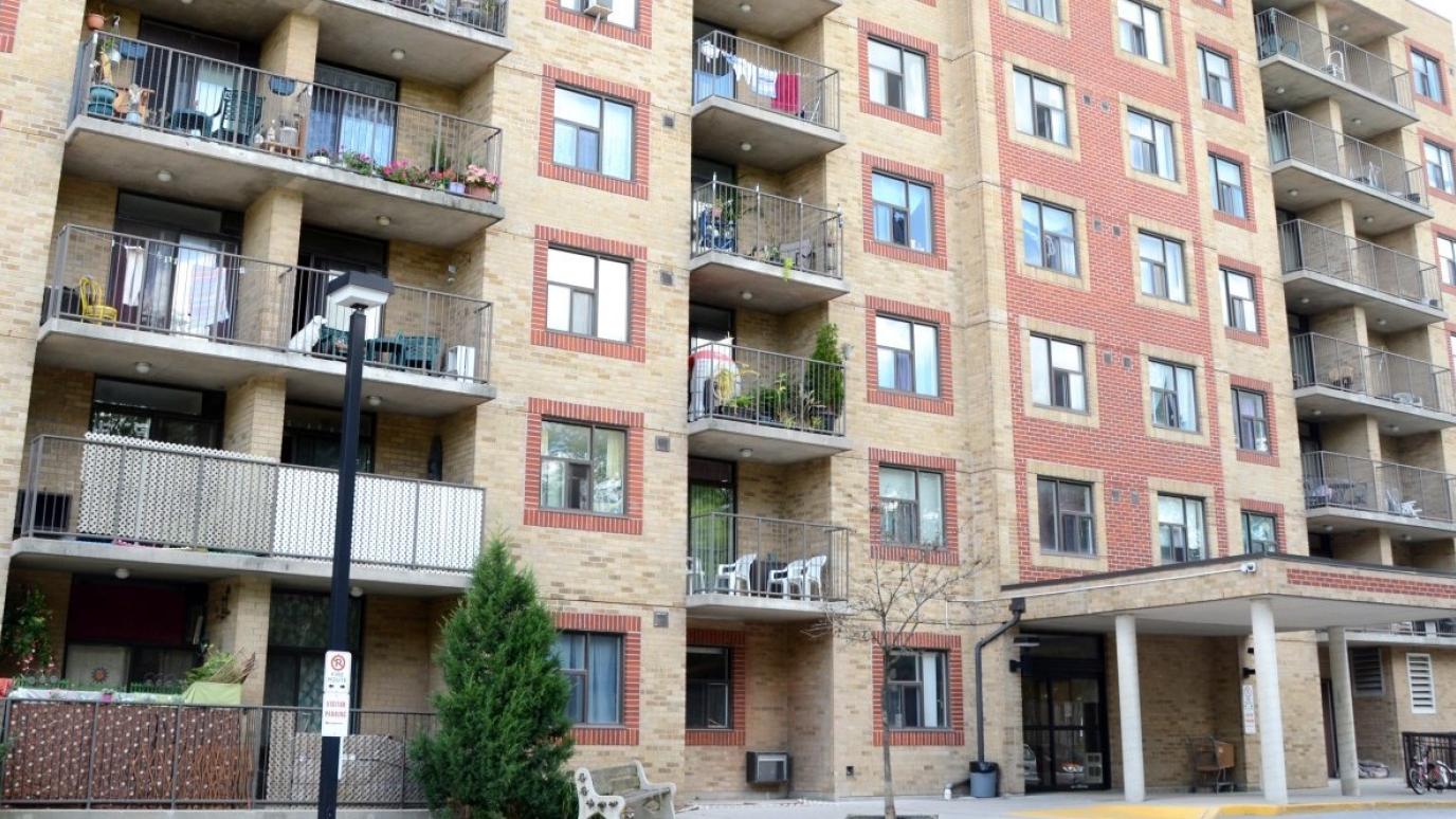 Exterior of 238 Willow Road, Guelph. It is a seven-storey apartment building.