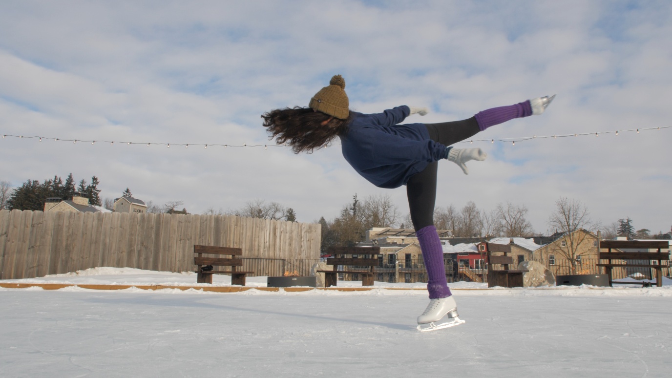 person skating on outdoor rink