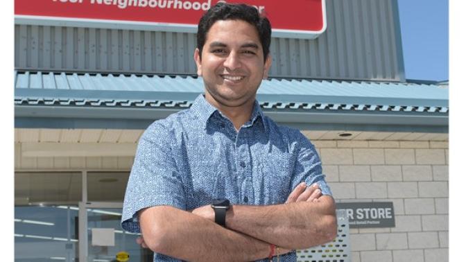 Mitual posing in front of freshmart