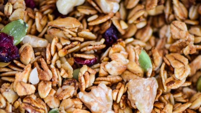 close up of granola with dried cranberries and pumpkin seeds