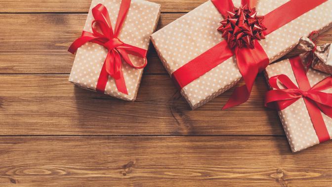 presents with red bows on table
