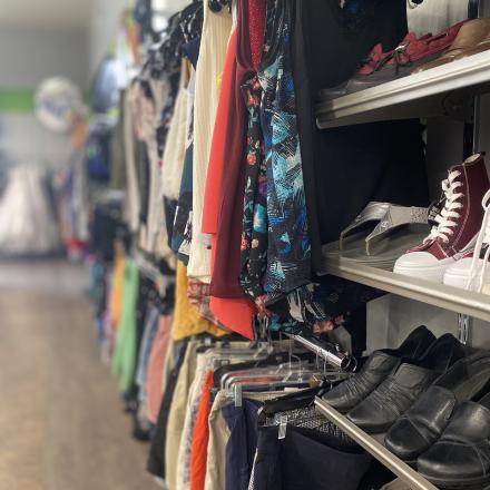 Clothes and shoes inside Mission Thrift