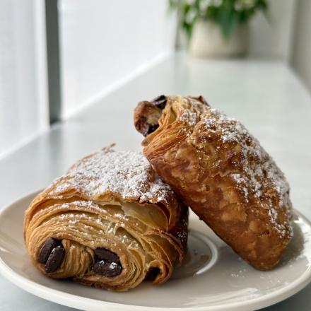 chocolate filled croissants on a white plate