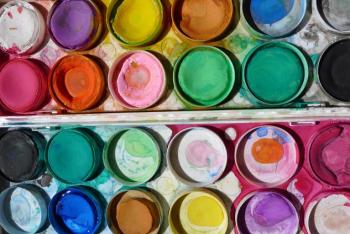 various containers with water colour paints