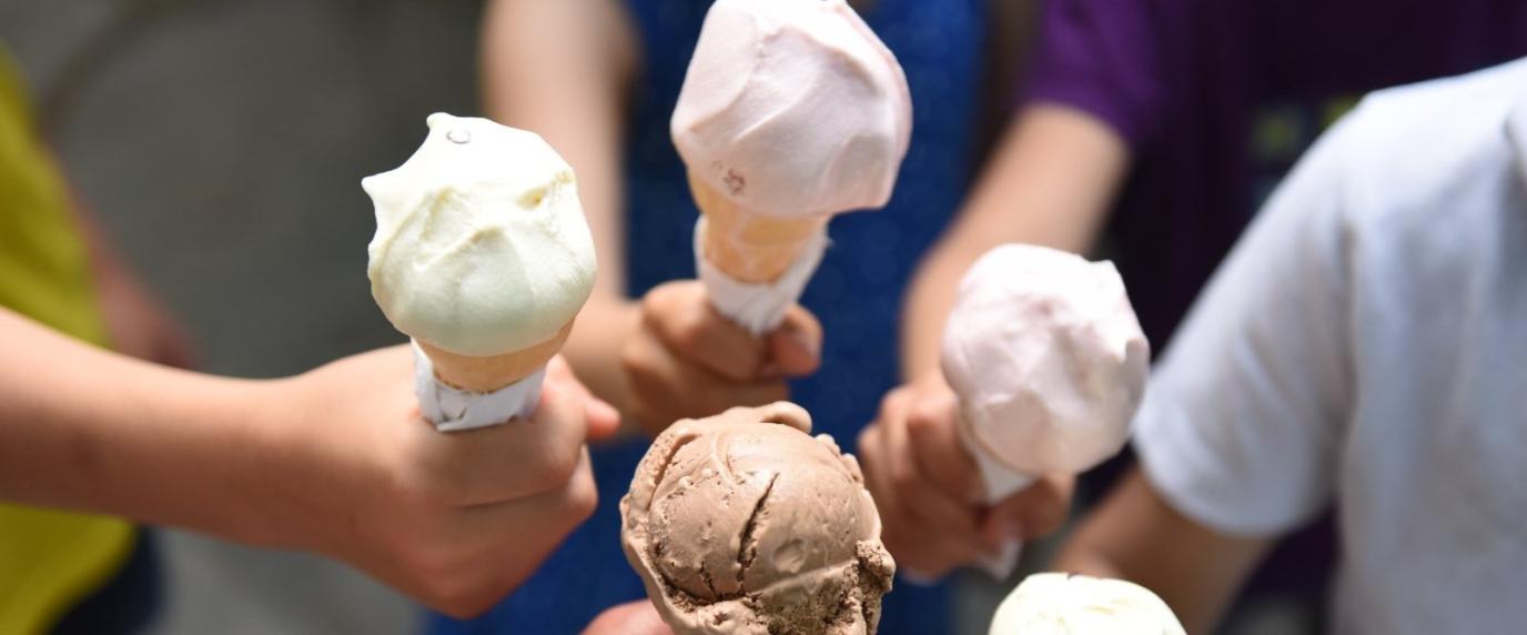 hands holding farm fresh ice cream