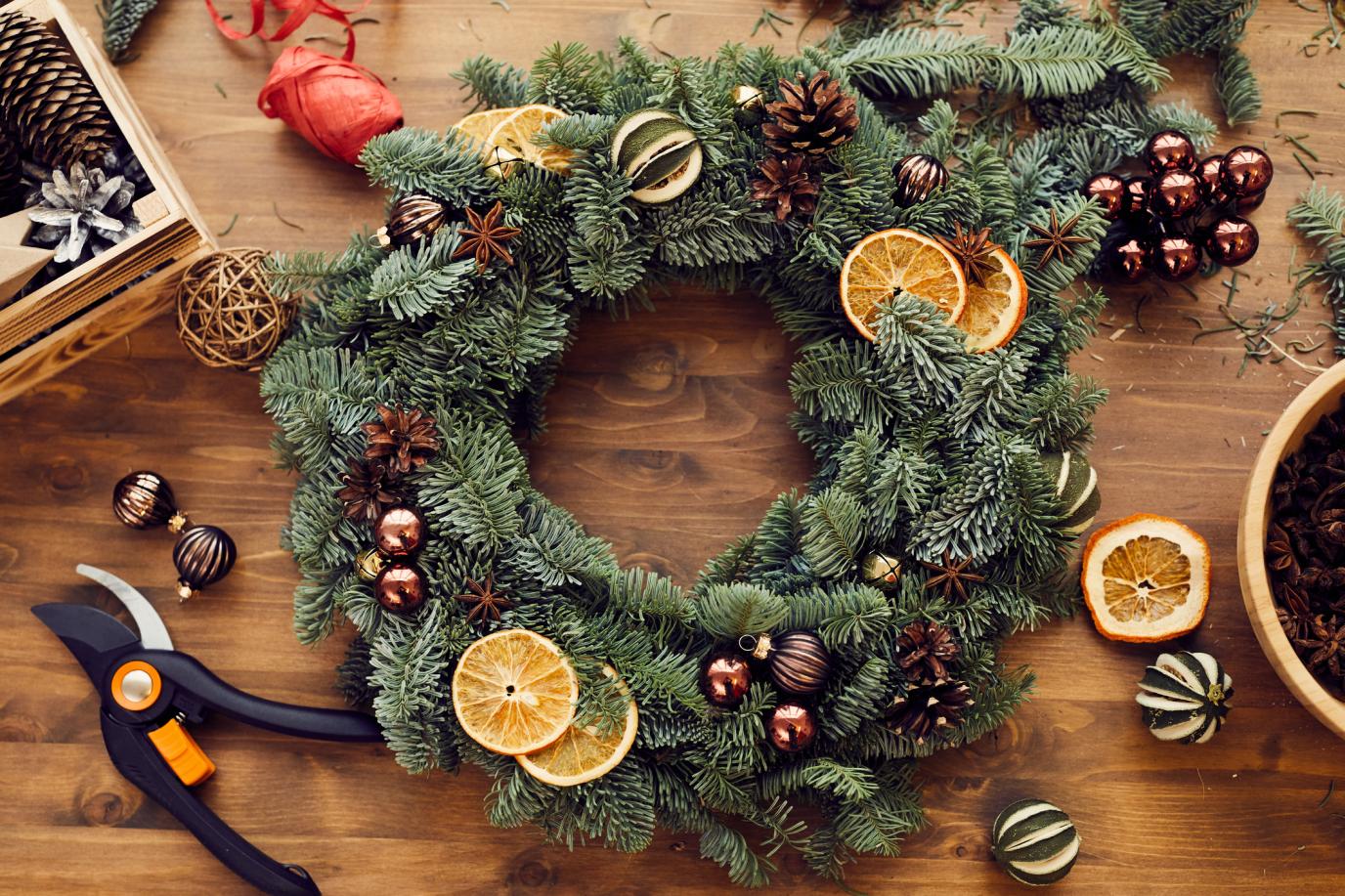 evergreen wreath on table